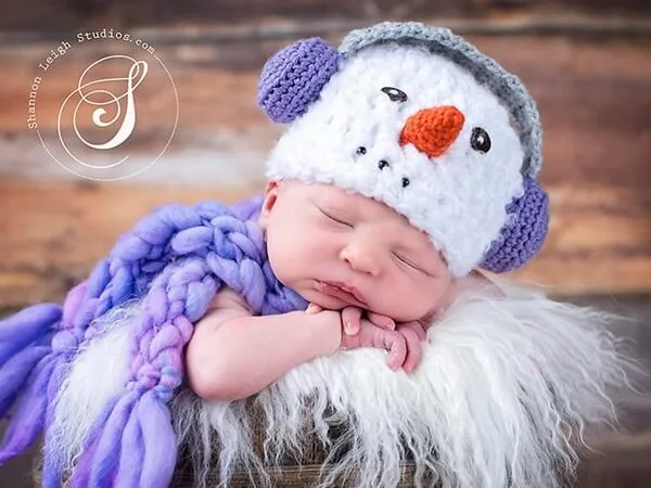 Snowman with earmuffs hat