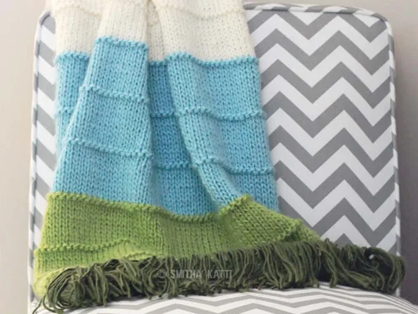 KNIT MULTI COLORED BLANKET