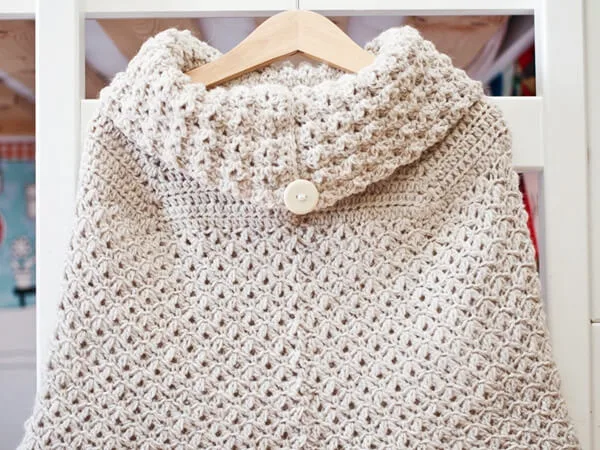 Poncho with oversized collar